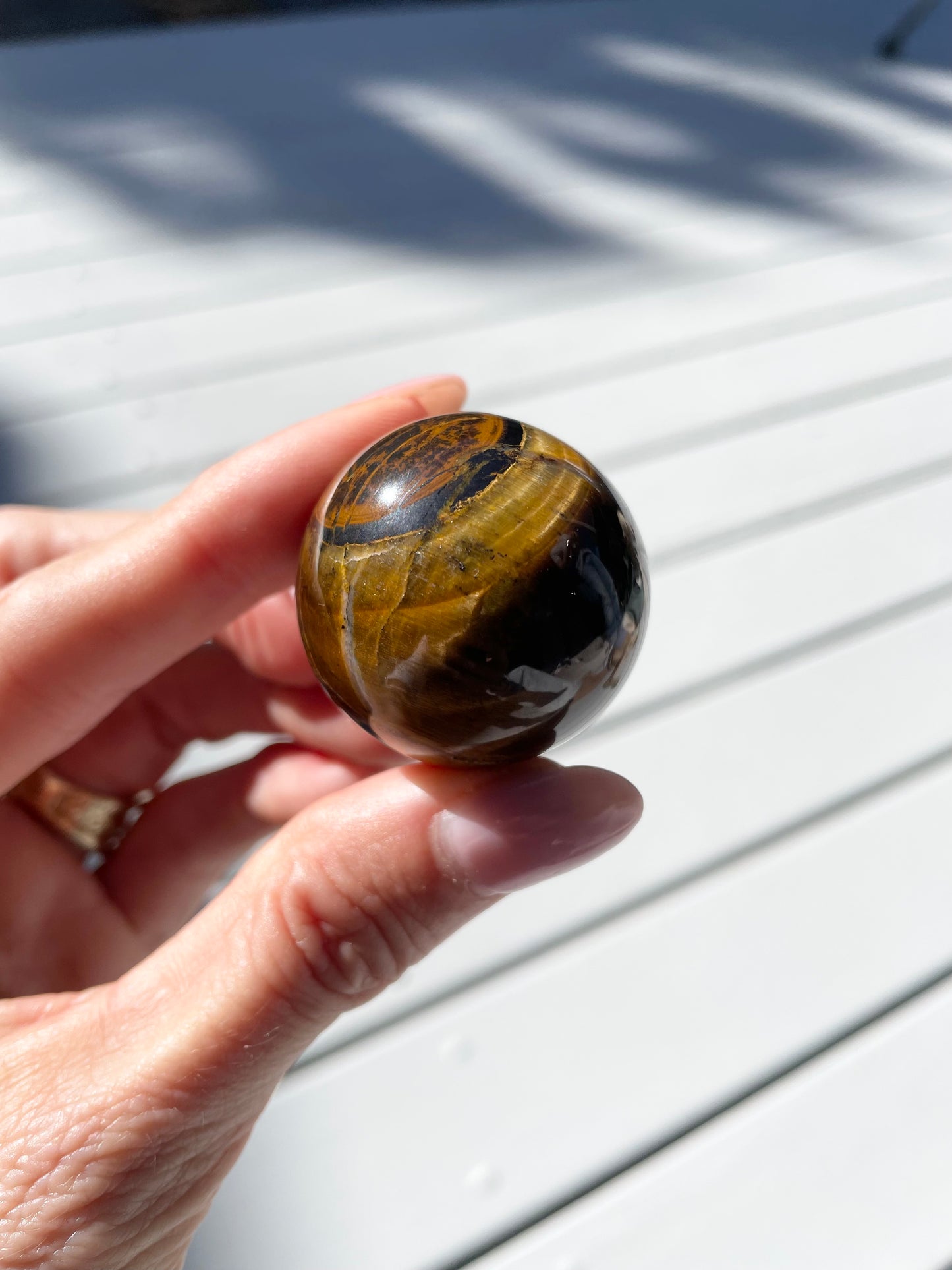 Tiger Eye Sphere includes holder