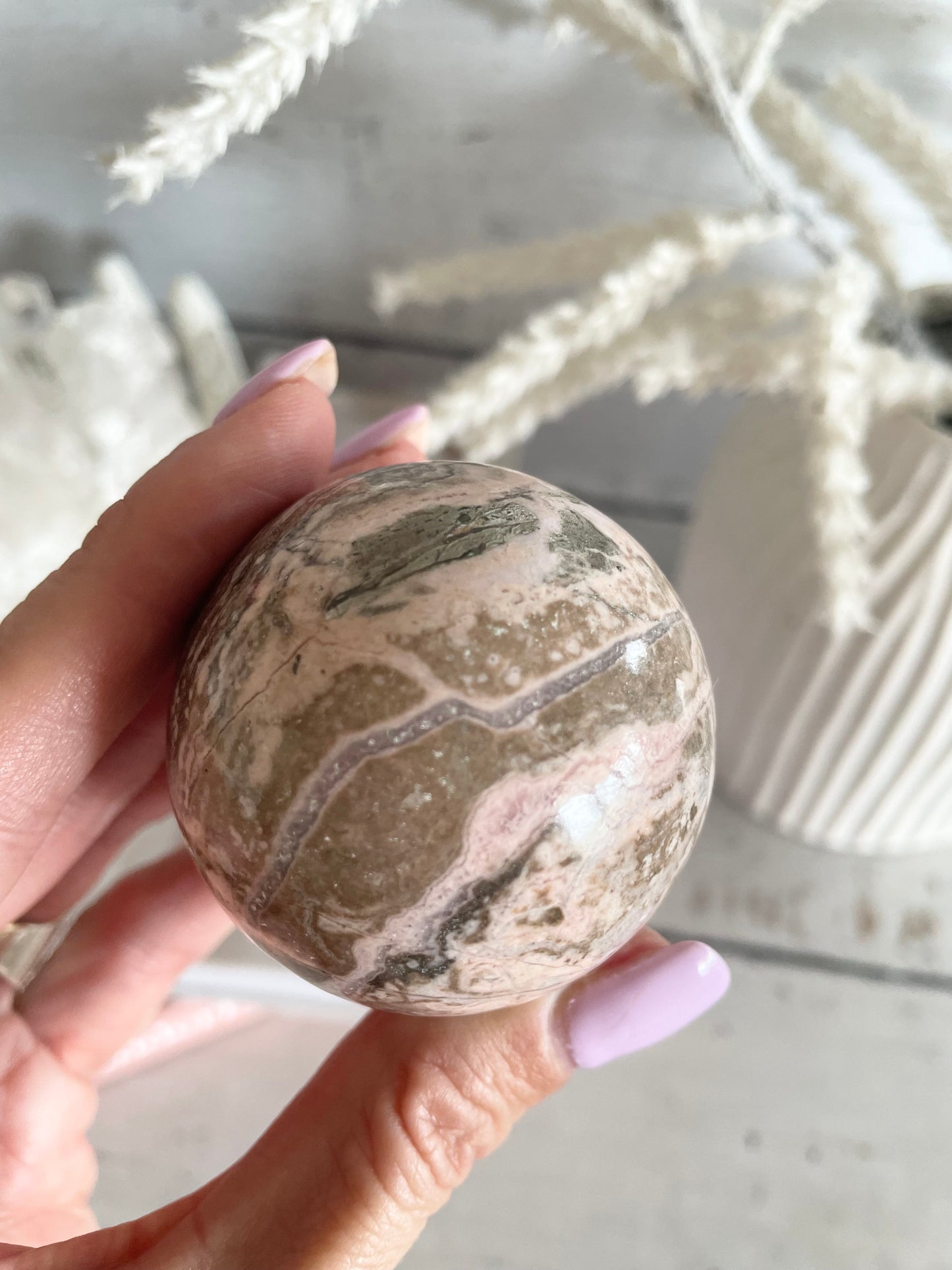 Rhodochrosite Sphere Includes Holder
