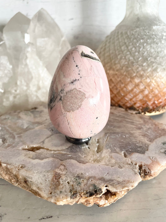 Rhodochrosite Egg includes holder