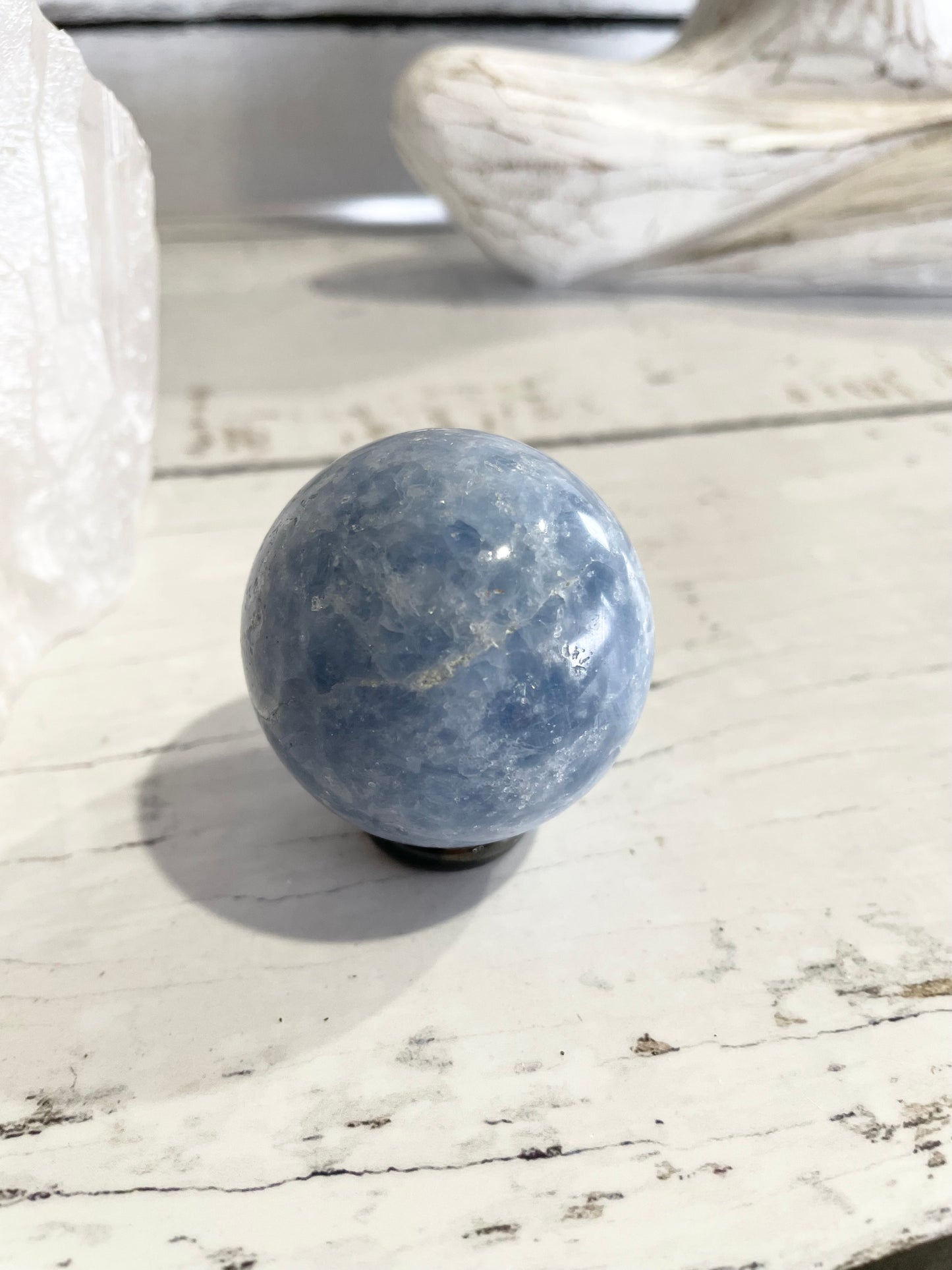 Blue Calcite Sphere Includes Wooden Holder