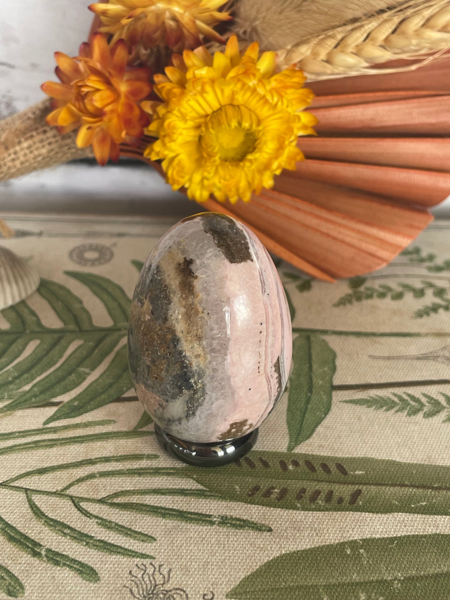 Rhodochrosite Egg Includes Hematite Ring