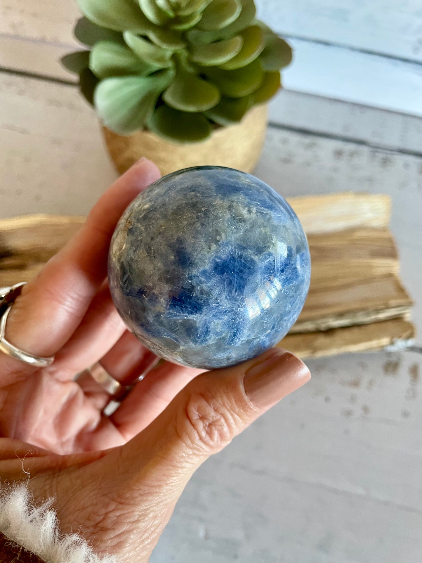 Kyanite Sphere Includes Wooden Holder