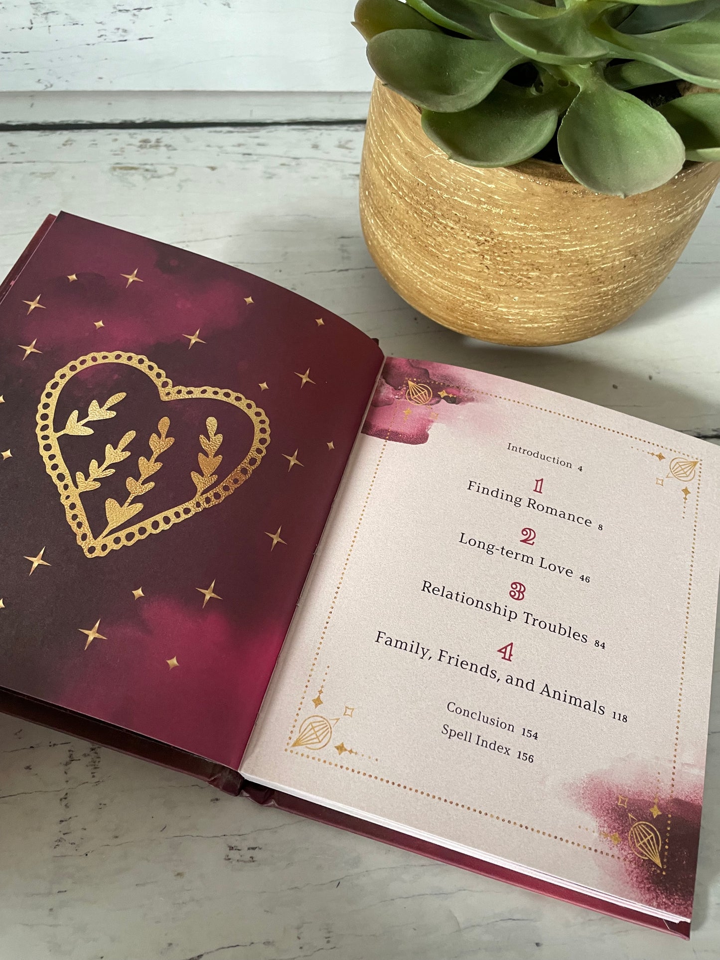 Love Spells : an enchanting spell book of potions & rituals