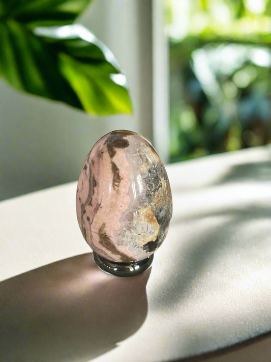 Rhodochrosite Egg with holder