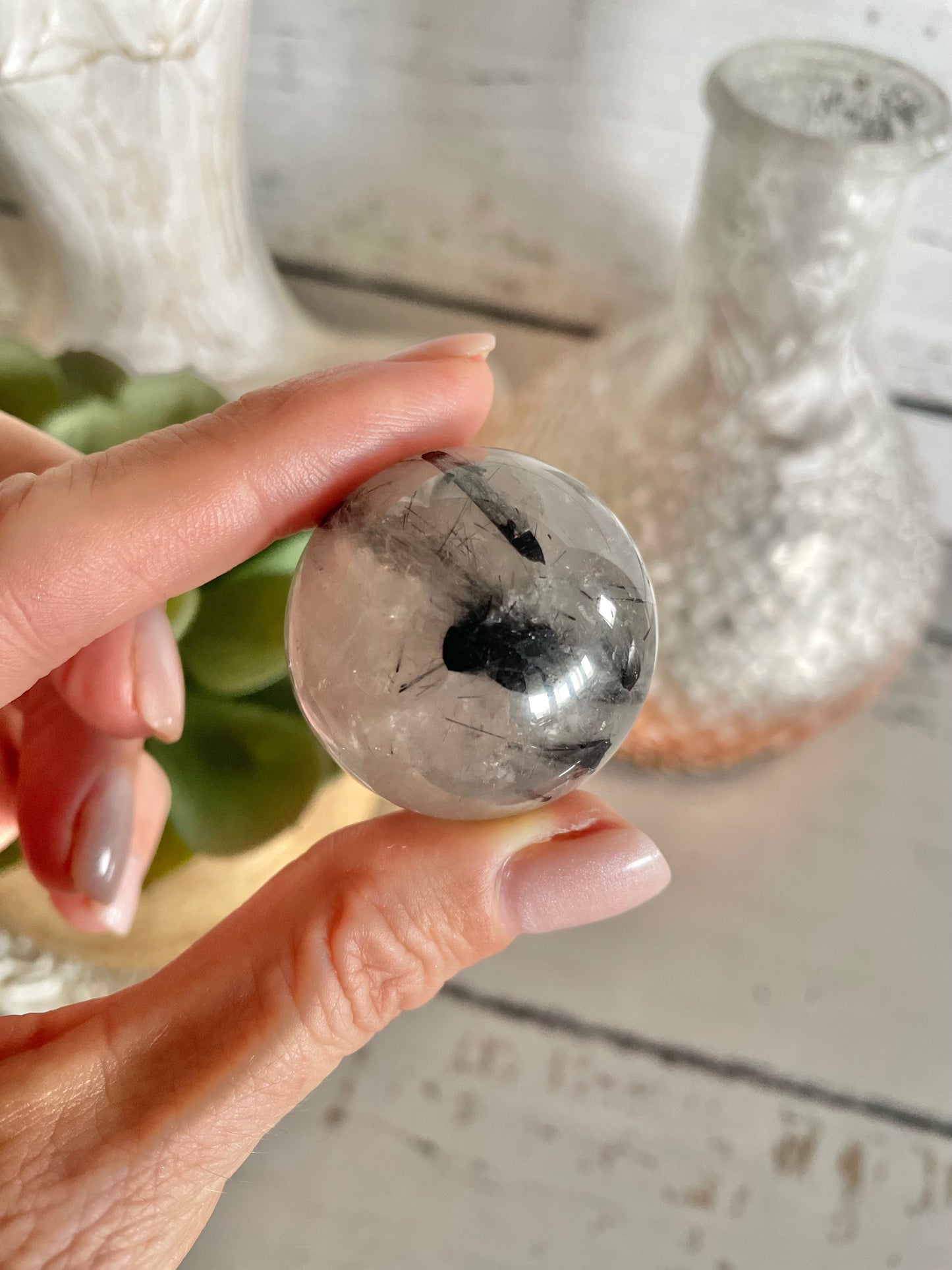 Tourmaline In Quartz Sphere Includes Holder
