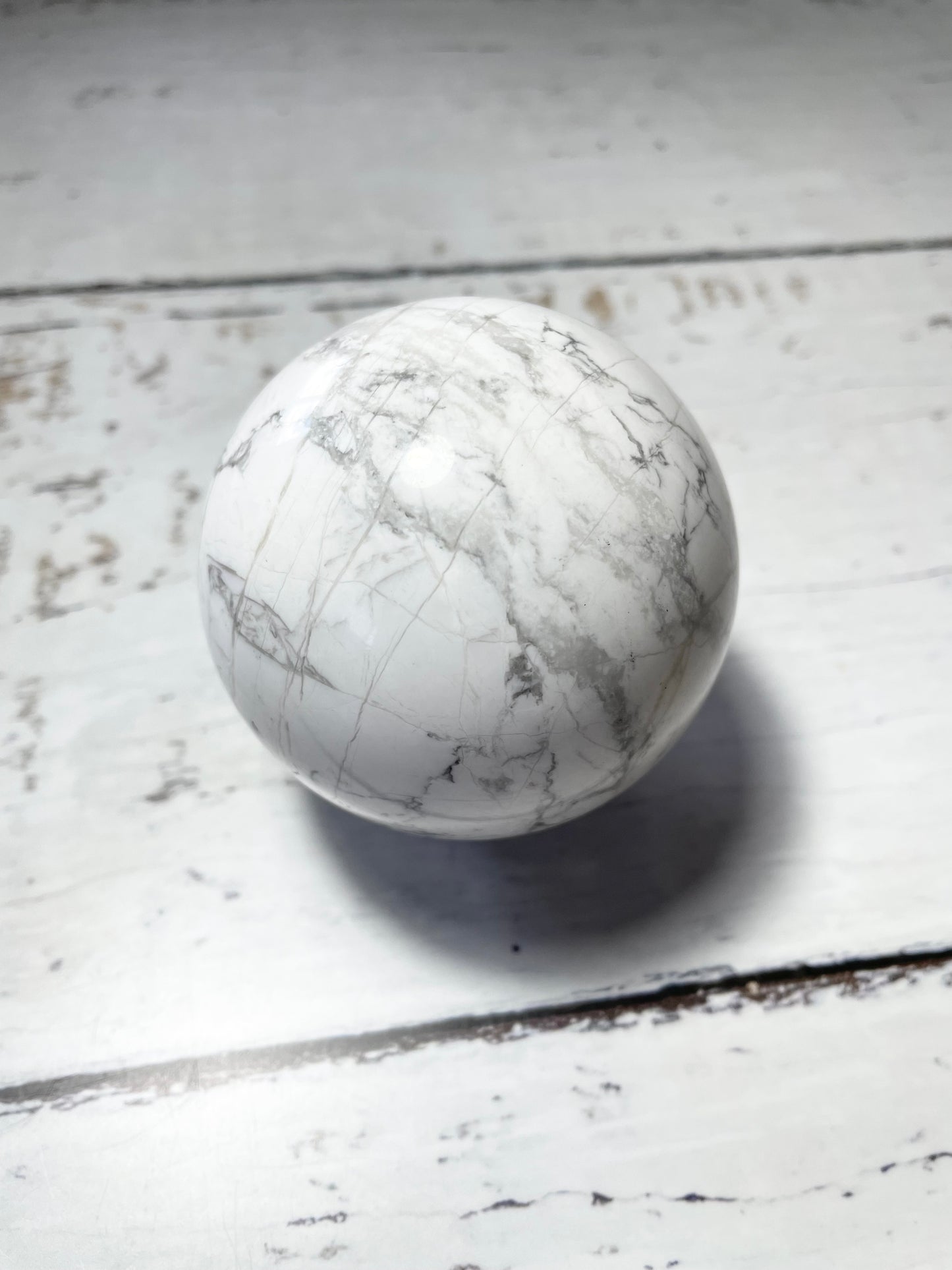 White Howlite Sphere includes holder