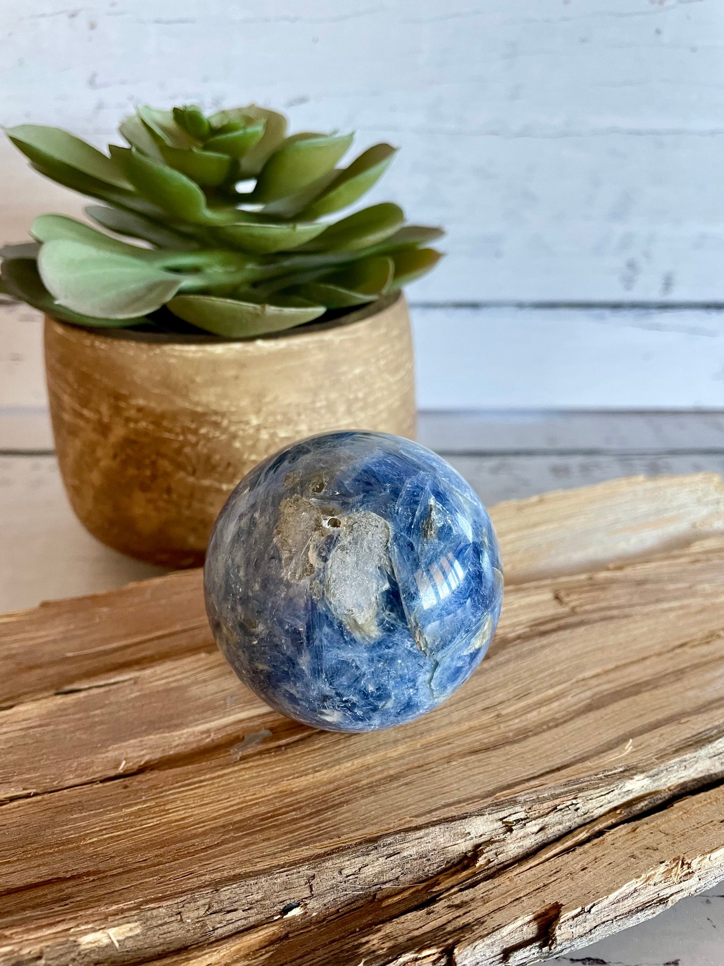 Kyanite Sphere Includes Wooden Holder