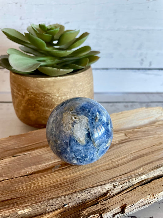 Kyanite Sphere Includes Wooden Holder