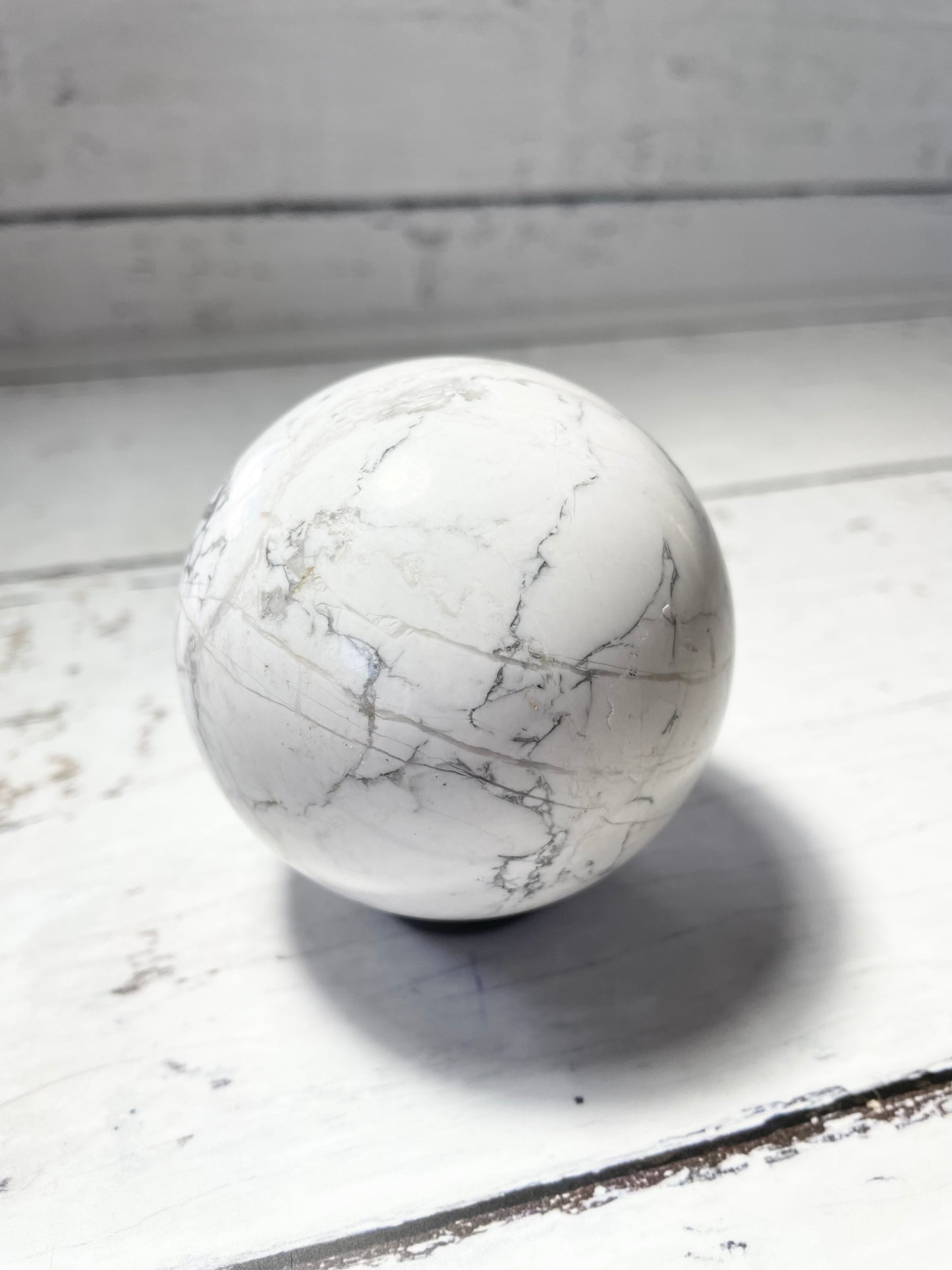 White Howlite Sphere includes holder