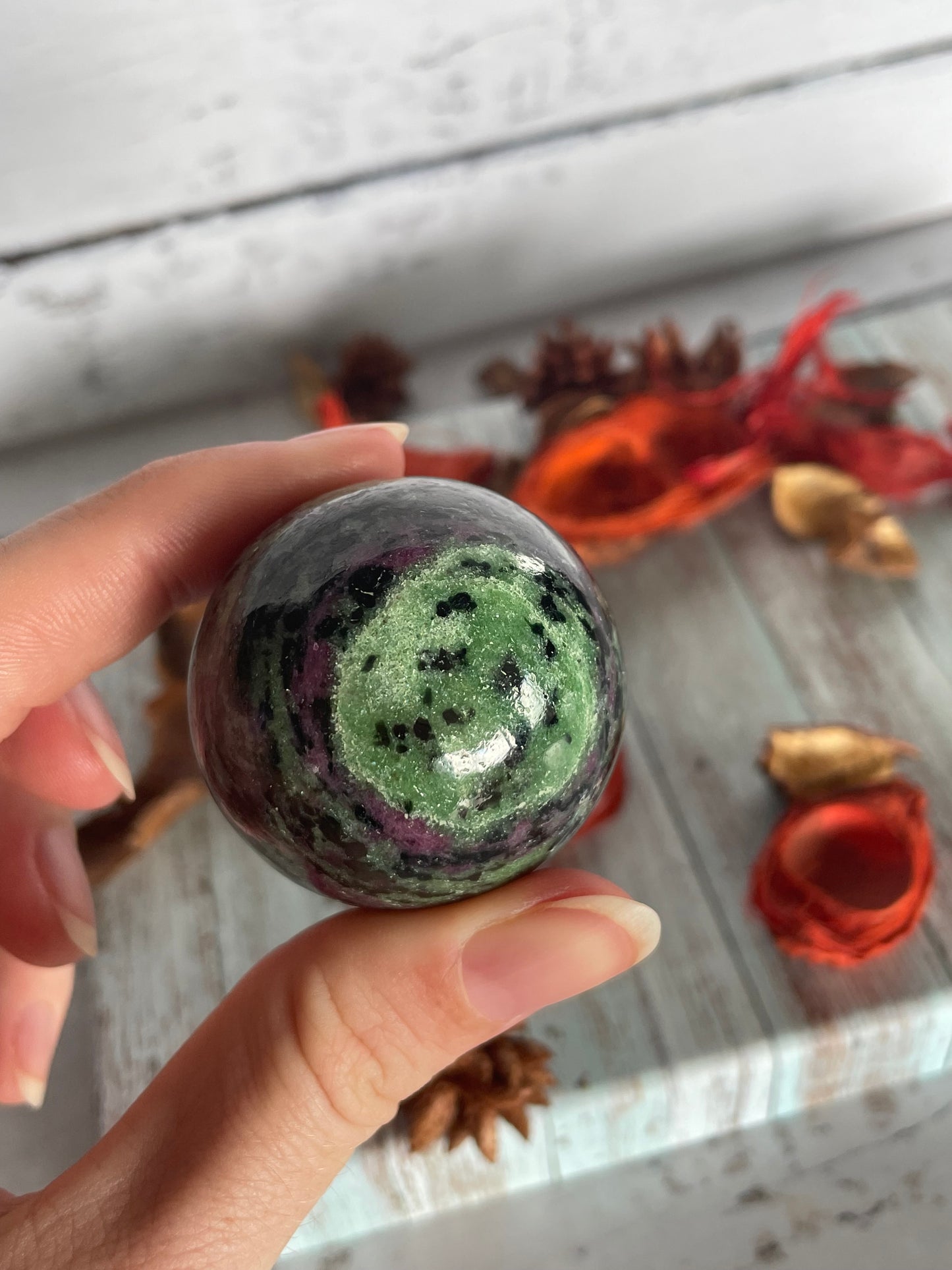 Ruby Zoisite Sphere Includes Wooden Holder