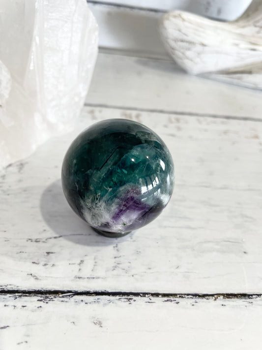 Rainbow Fluorite Sphere Includes Wooden Holder