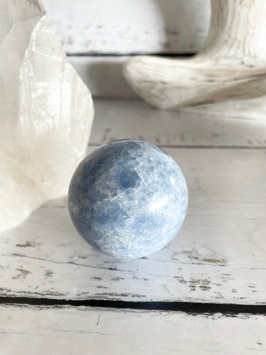 Blue Calcite Sphere Includes Wooden Holder