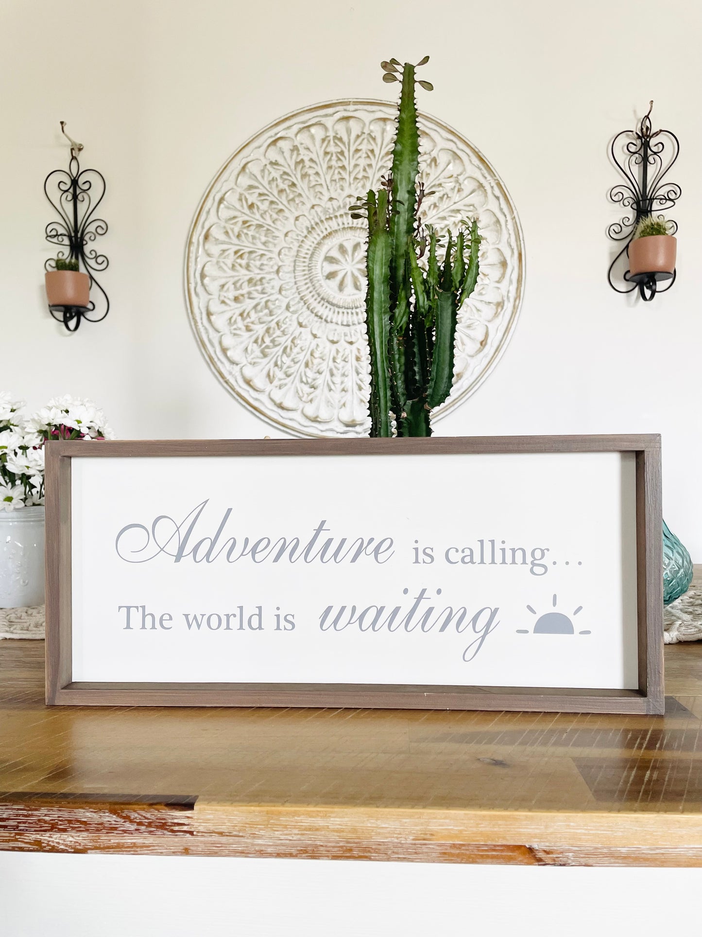 Adventure Is Calling sign
