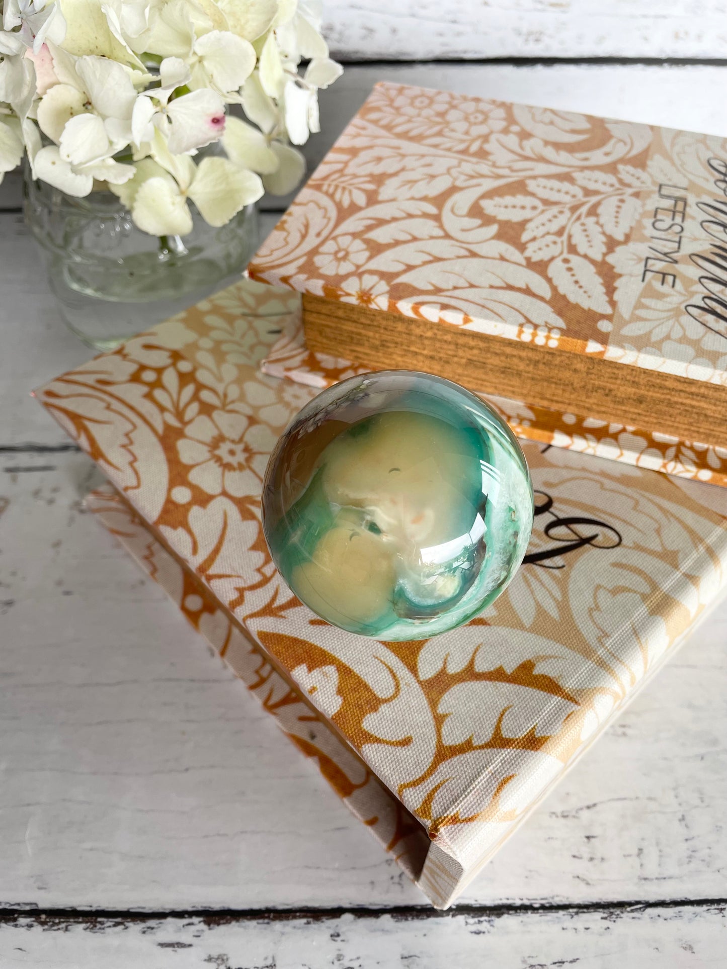 Green Flower Agate Sphere includes wooden holder