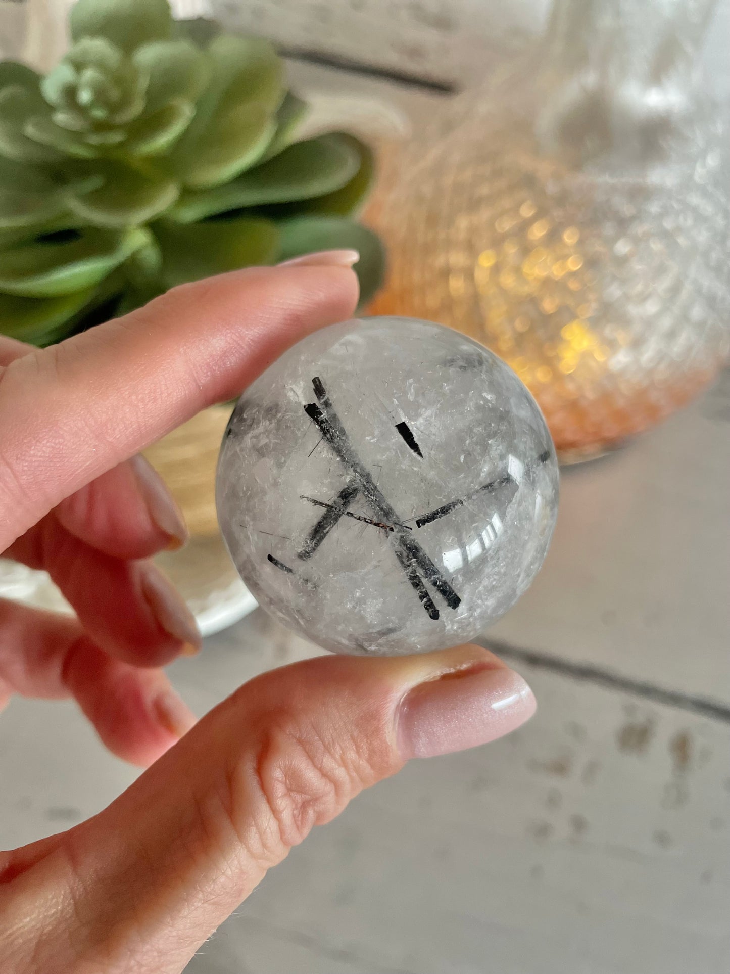 Tourmaline In Quartz Sphere Includes Holder