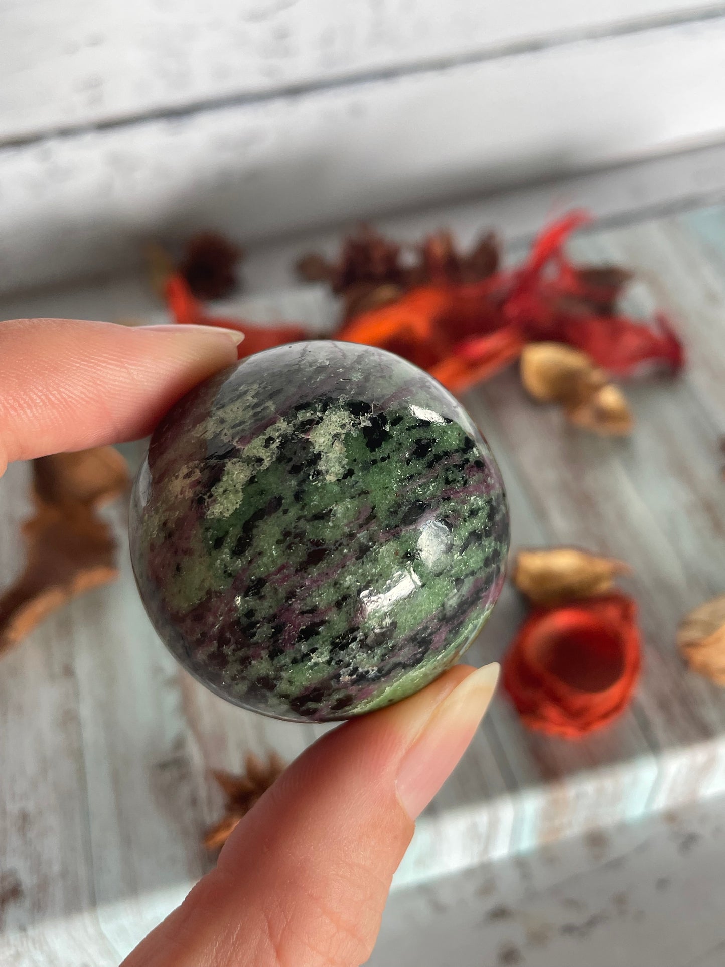 Ruby Zoisite Sphere Includes Wooden Holder