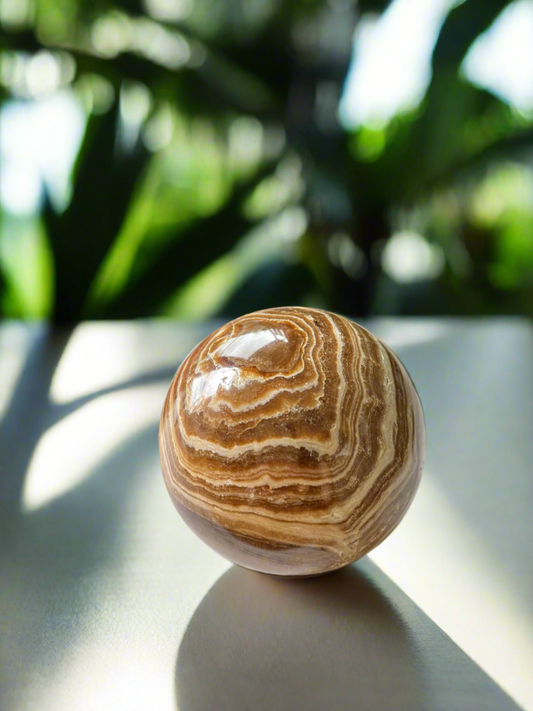 Chocolate Calcite Sphere includes Holder