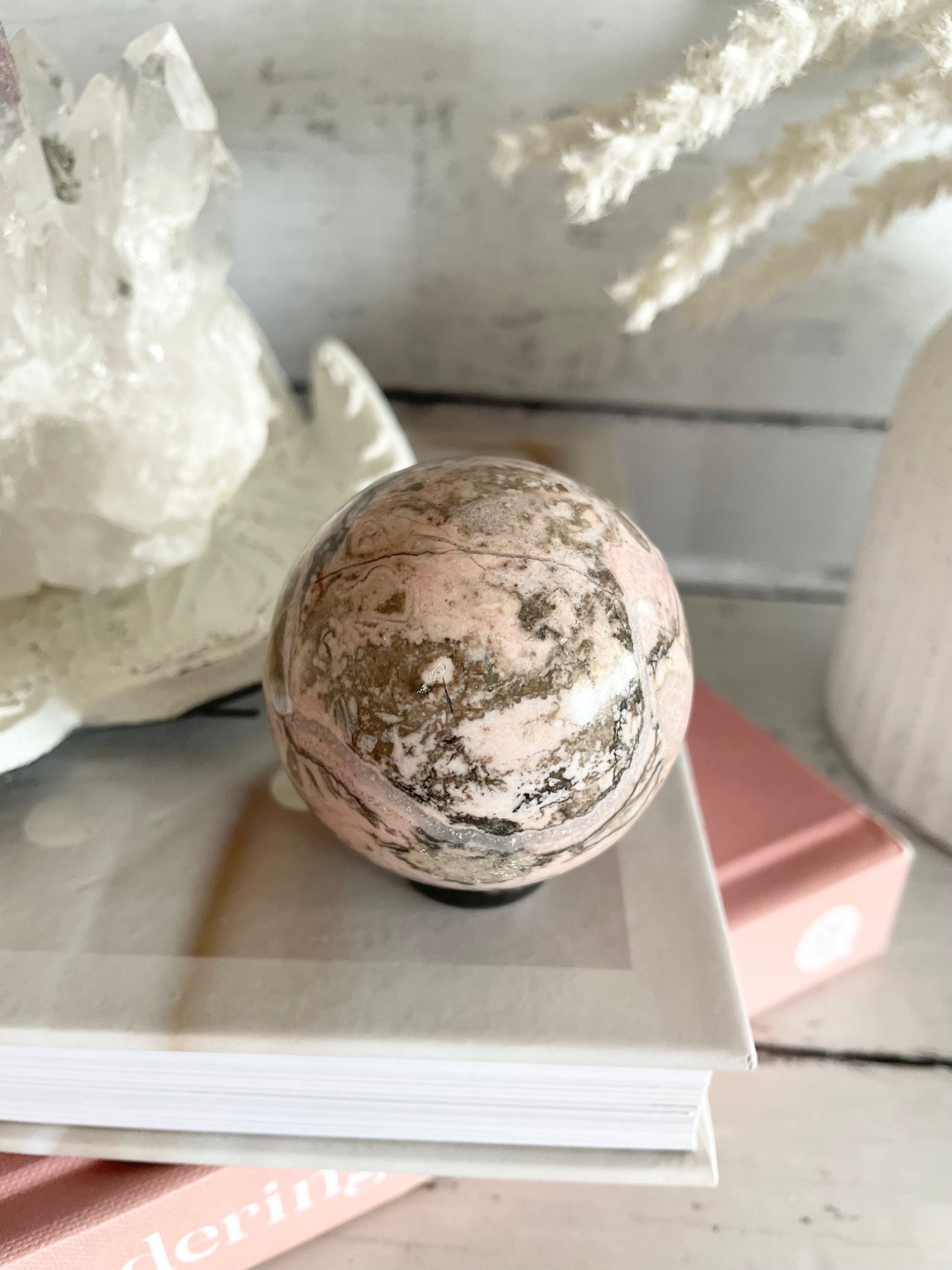 Rhodochrosite Sphere Includes Holder