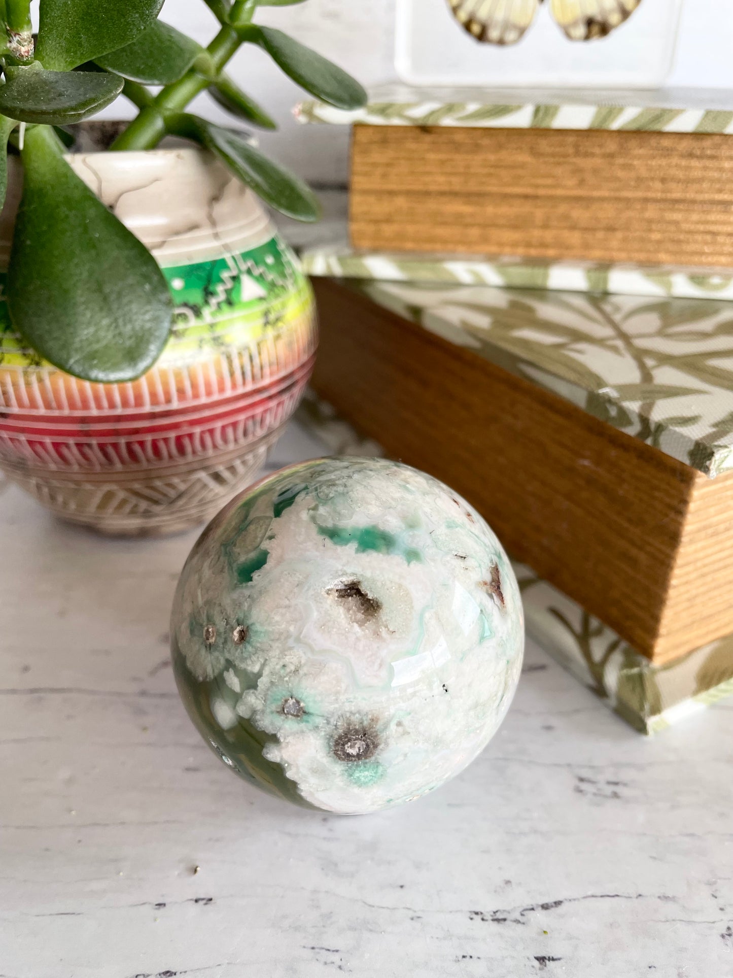 Green Flower Agate Sphere includes wooden holder