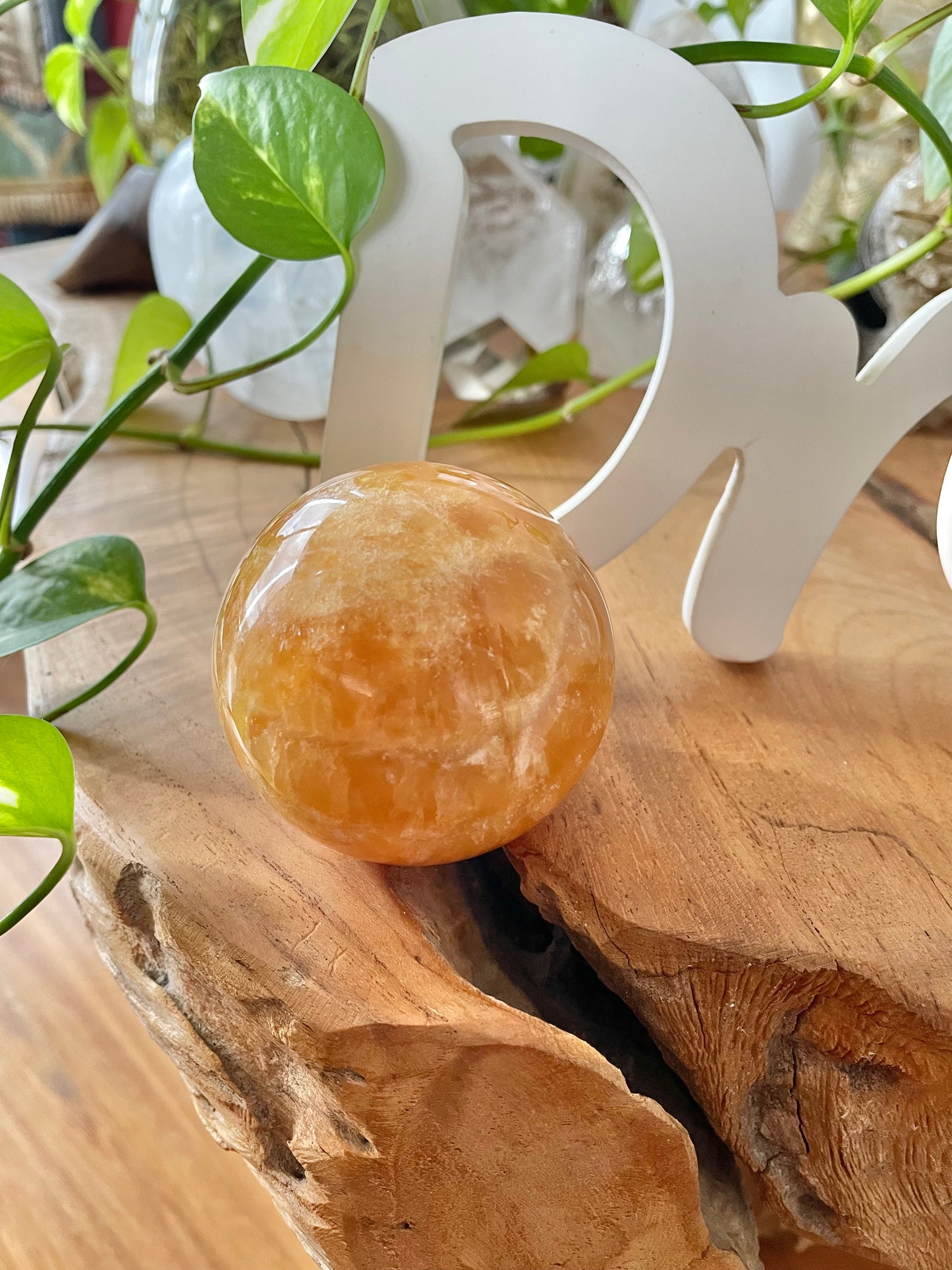 Orange Calcite Sphere Includes Wooden Holder