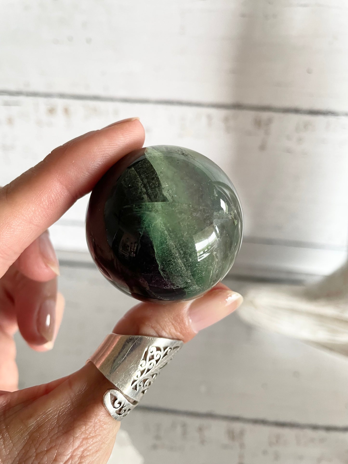 Rainbow Fluorite Sphere Includes Wooden Holder