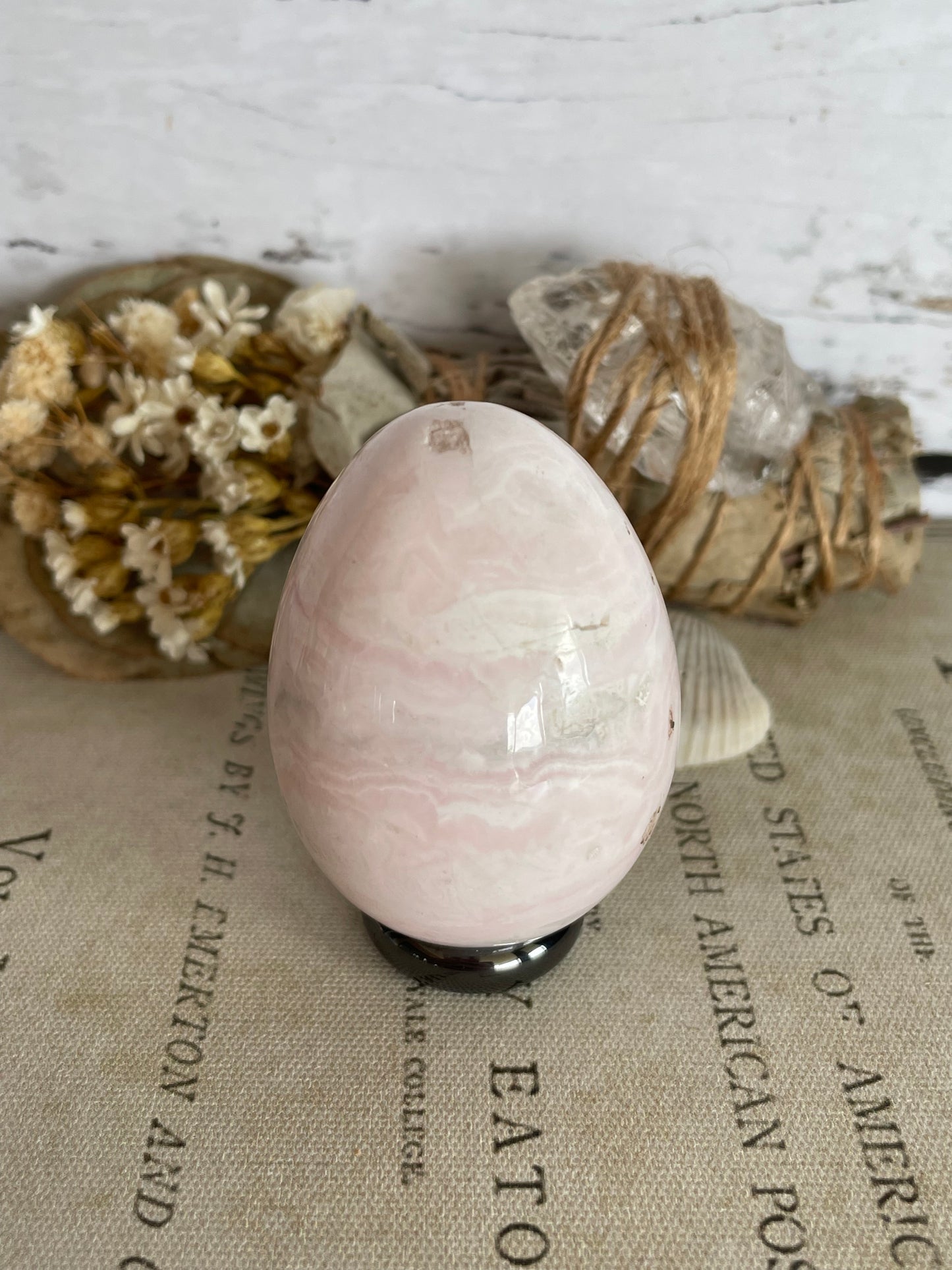 Mangano Calcite Egg Includes Hematite Ring