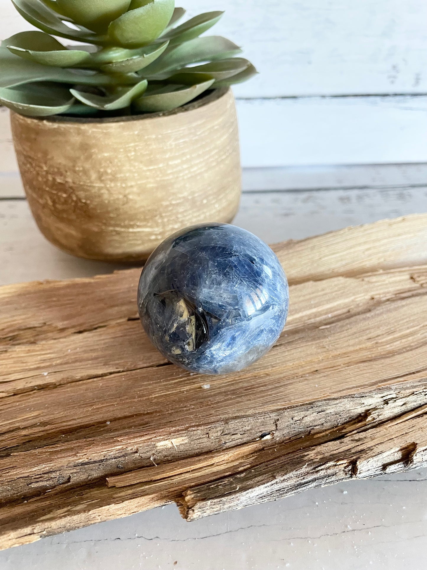 Kyanite Sphere Includes Wooden Holder