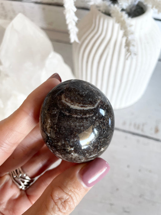 Black Opal Pillow Palm Stone