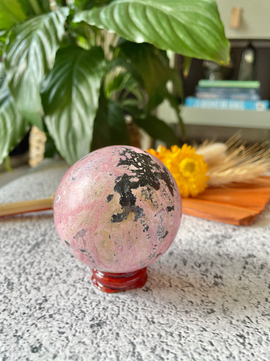 Rhodonite Sphere Includes Wooden Holder