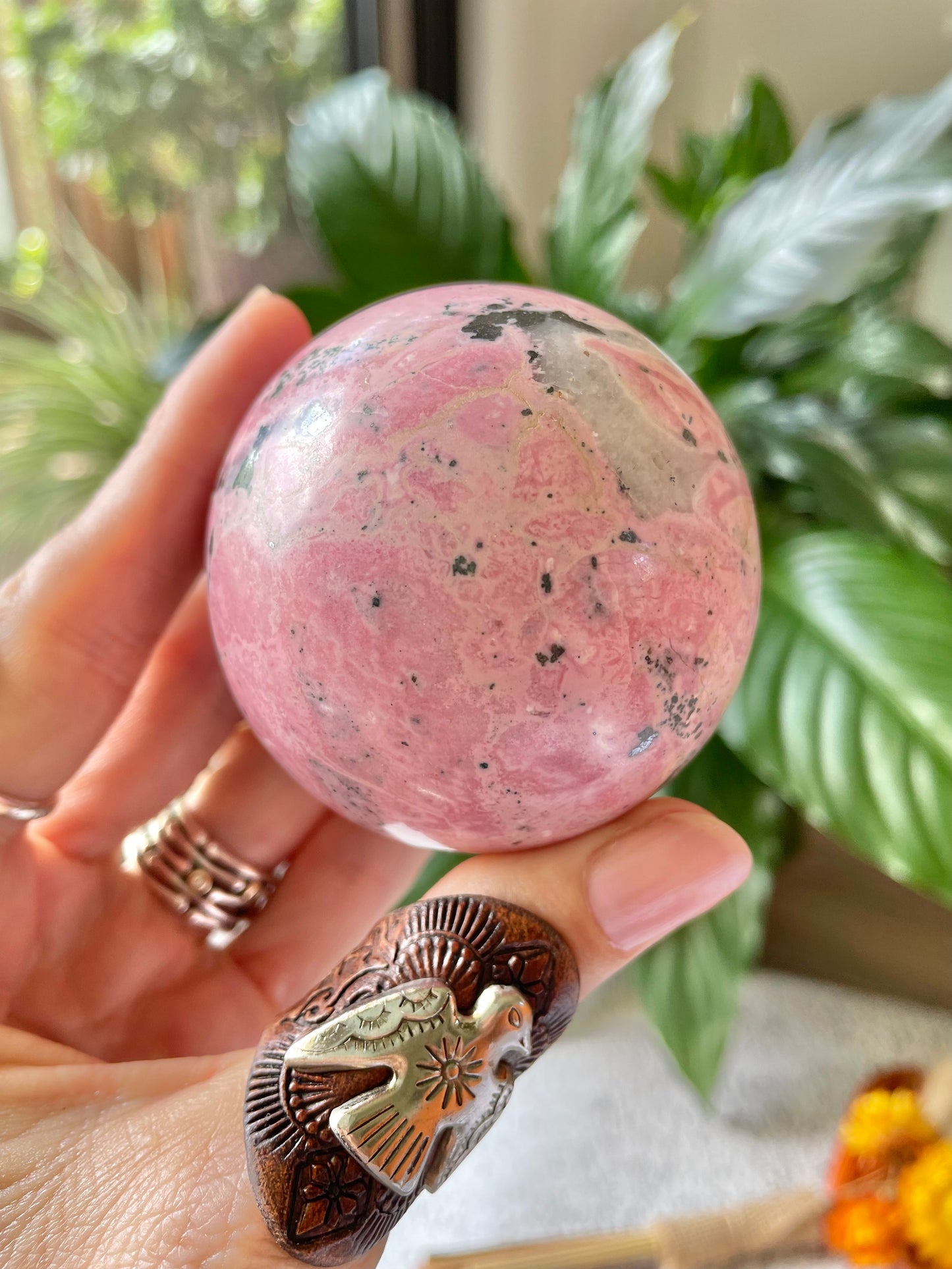 Rhodonite Sphere Includes Wooden Holder